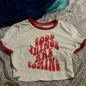 Red and White Cropped Top that says “Good Things Are Coming”